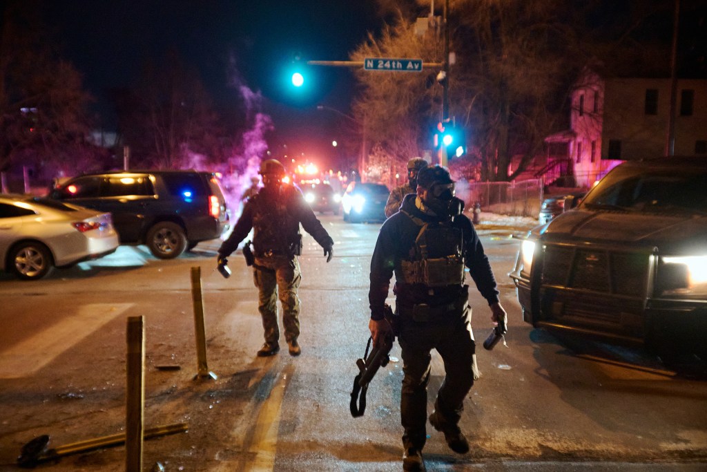 ICE officer in Texas-Minnesota fight turns himself in to face shooting charges, AP reports